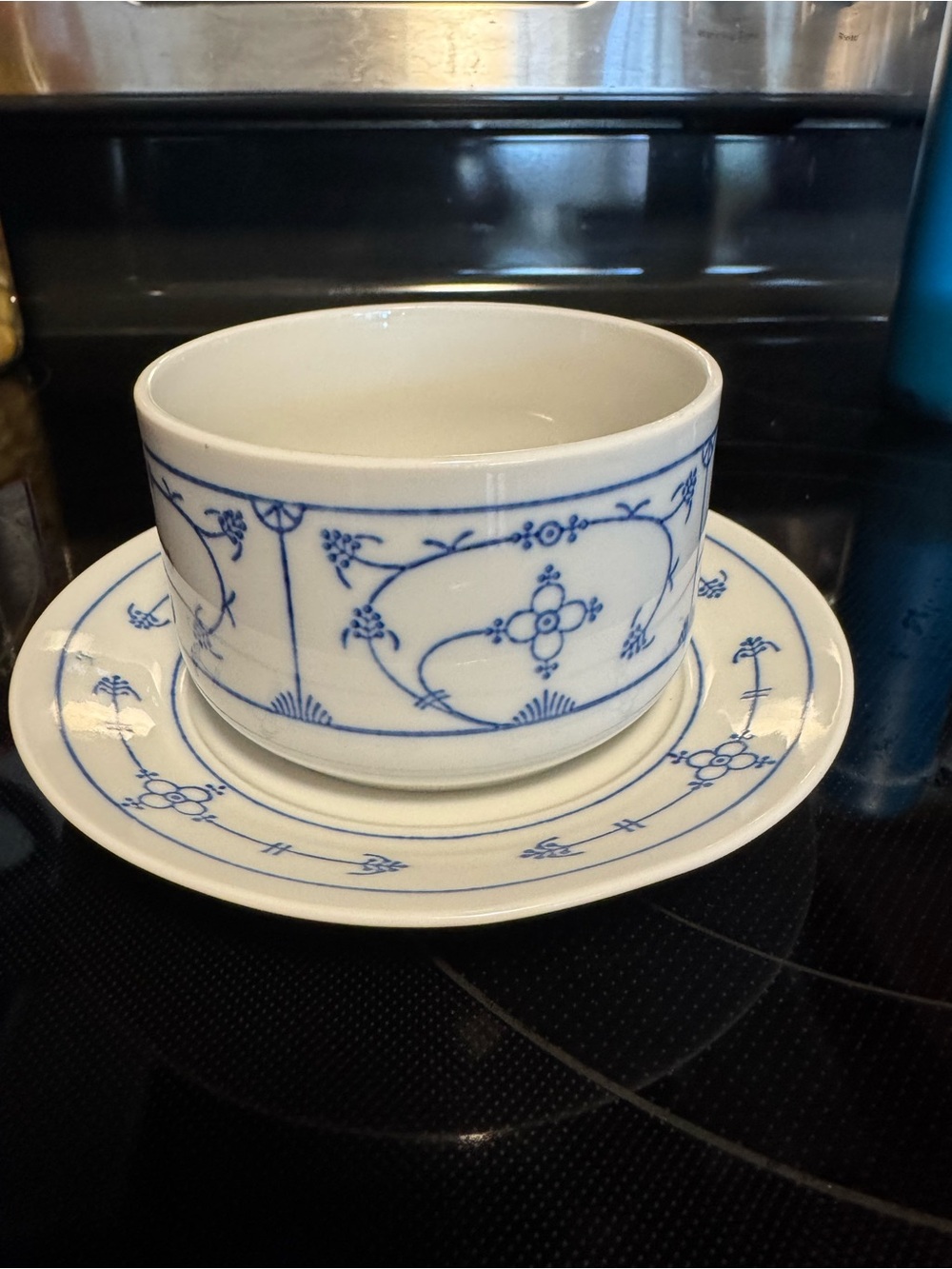 Blue Floral Porcelain Gravy Boat, attached saucer